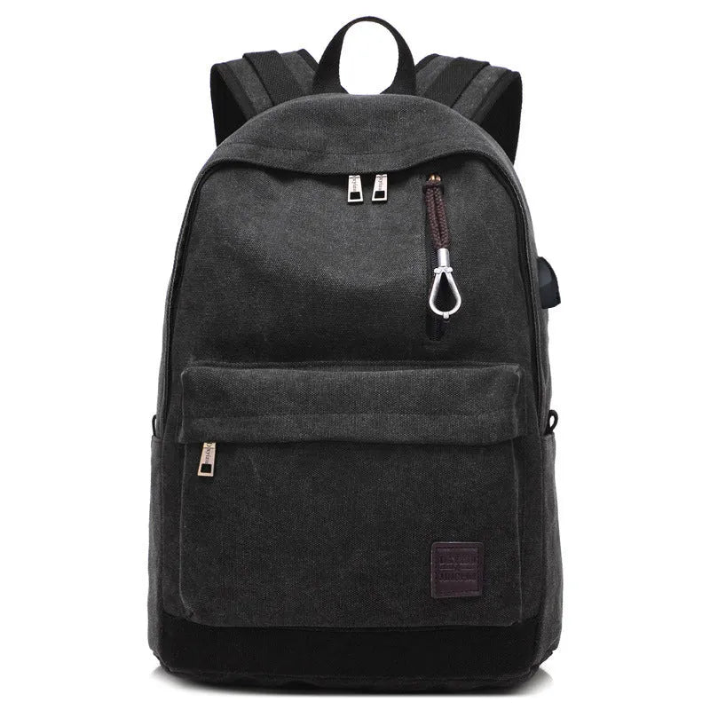 Coffee coloured canvas backpack with USB charging port and multiple zippered compartments