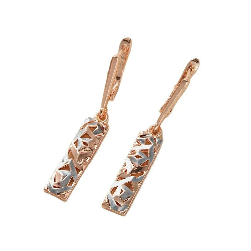 Rectangular two-tone hollow stud earrings with geometric design and electroplated finish