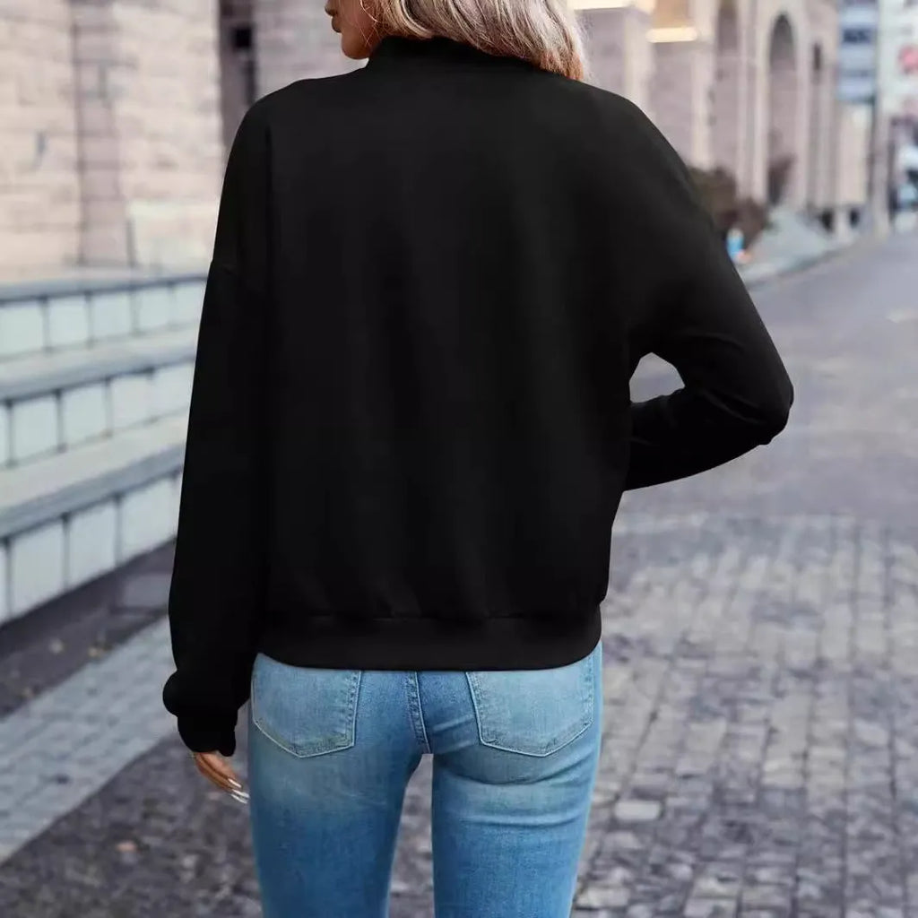 Black women's casual zip jacket with long sleeves and faux pocket detail