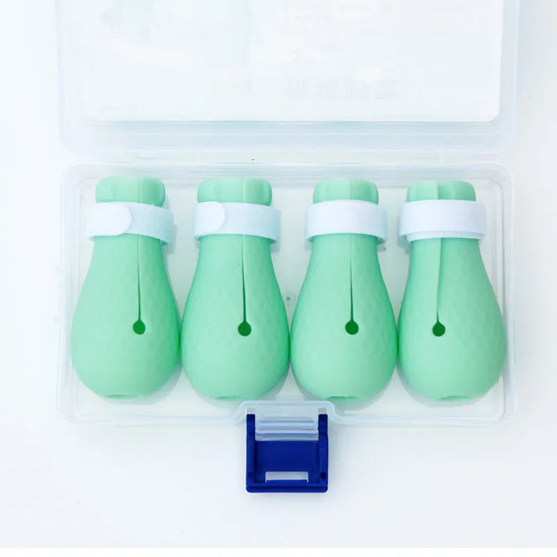 Green silicone cat paw cover gloves for scratch protection during washing and handling
