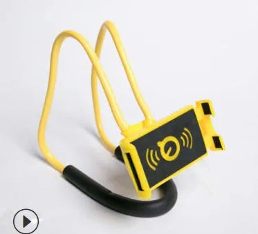 White plastic and foam 360-degree rotatable universal phone holder on a table.