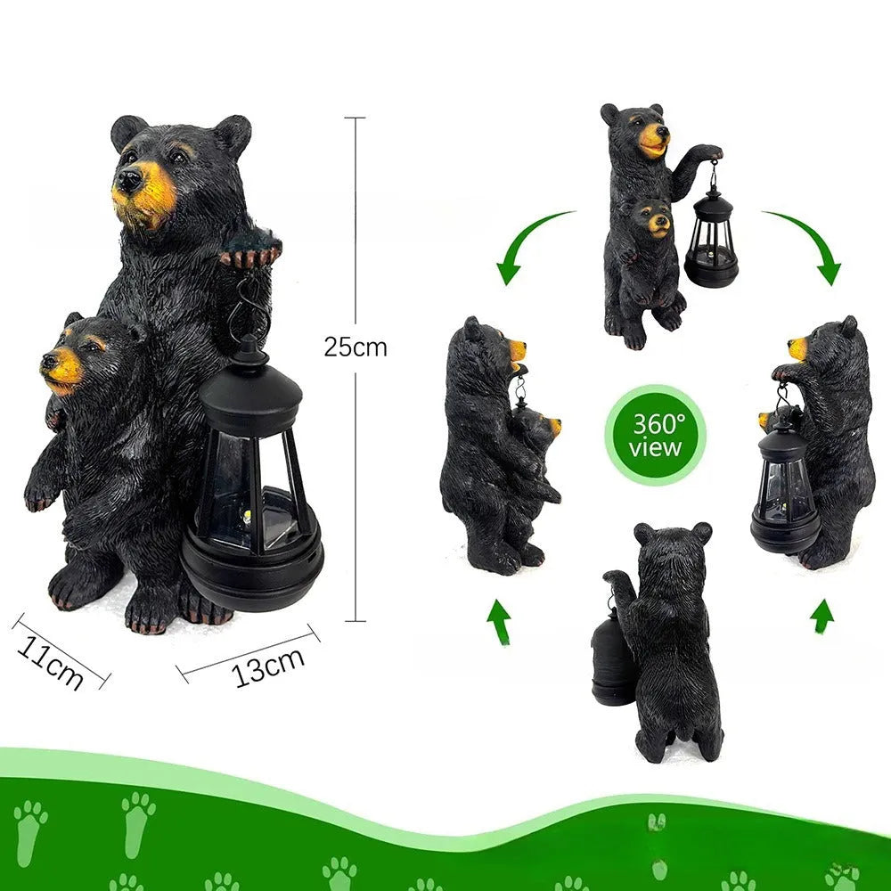 Resin black bear mother and child lantern ornament on a wooden shelf