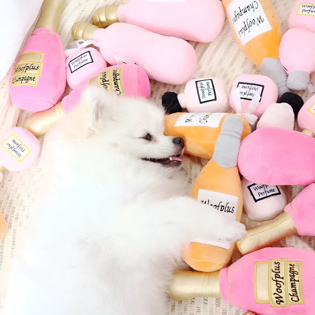 Soft plush dog toy shaped like a colourful wine bottle for gentle chew play.