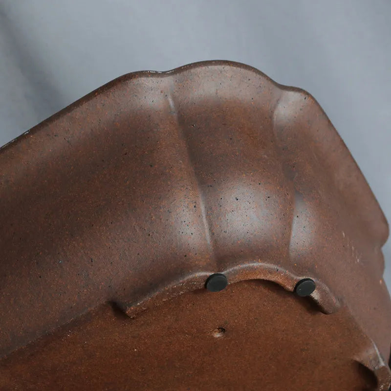 Purple sand rectangular ceramic bonsai pot on a flat surface.