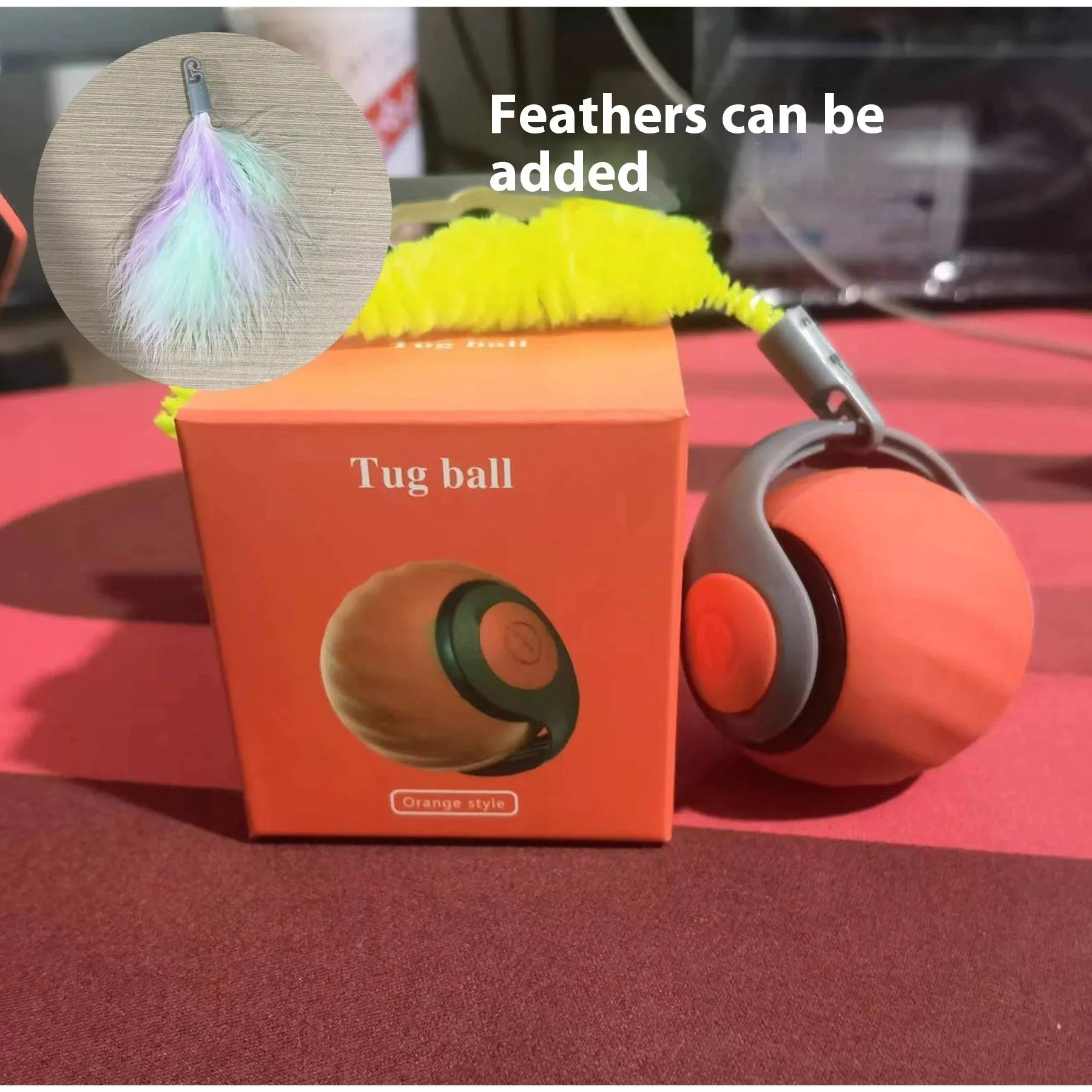 Automatic cat toy car with silicone spike ball in blue rolling on wooden floor