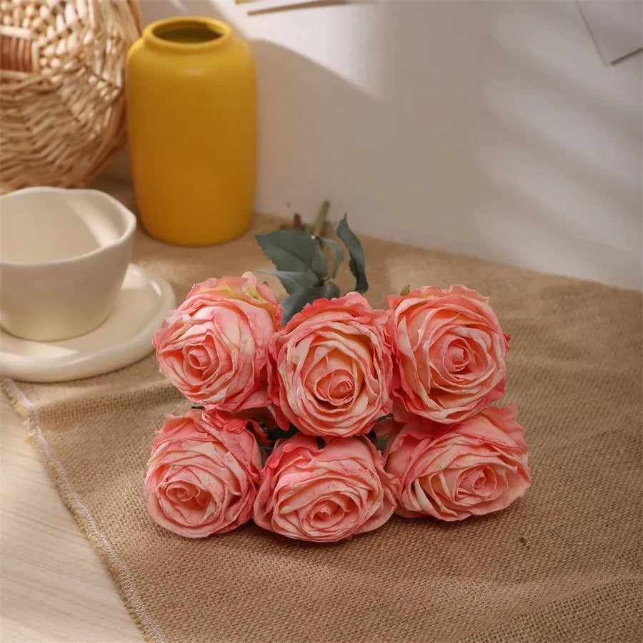 Single burnt edge simulated silk rose artificial flower with 38cm stem on neutral background