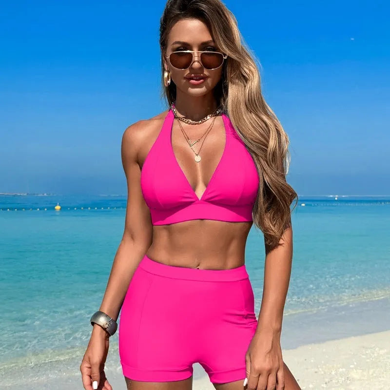 Women's two-piece nylon bikini swimsuit in black, pink, purple blue, or sapphire blue for swimming.