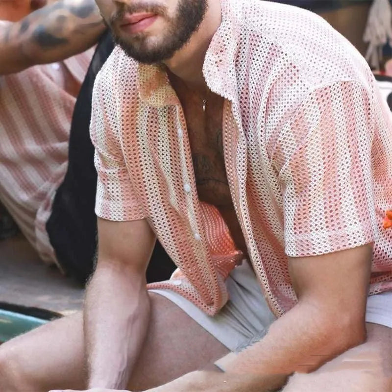 Pink waffle knit men's cardigan shirt with short sleeves laid flat