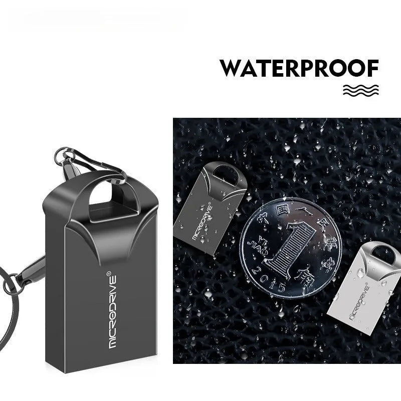 Small black and silver metal USB flash drive on a white background showing its compact size.