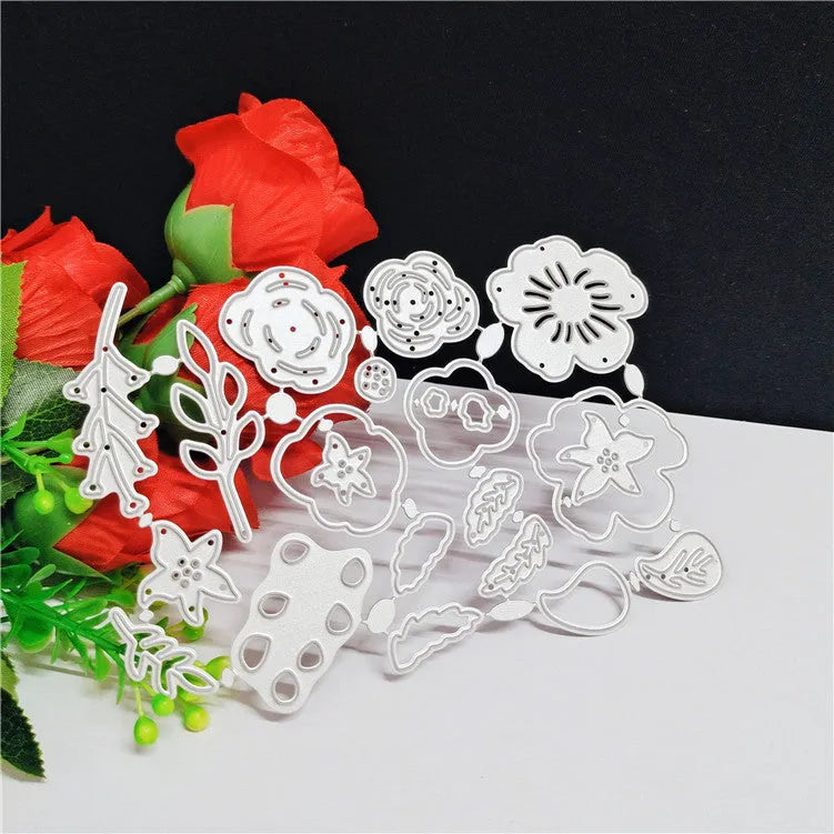 Silver carbon steel cutting die with plant design pattern measuring 14.3 by 9.9 cm
