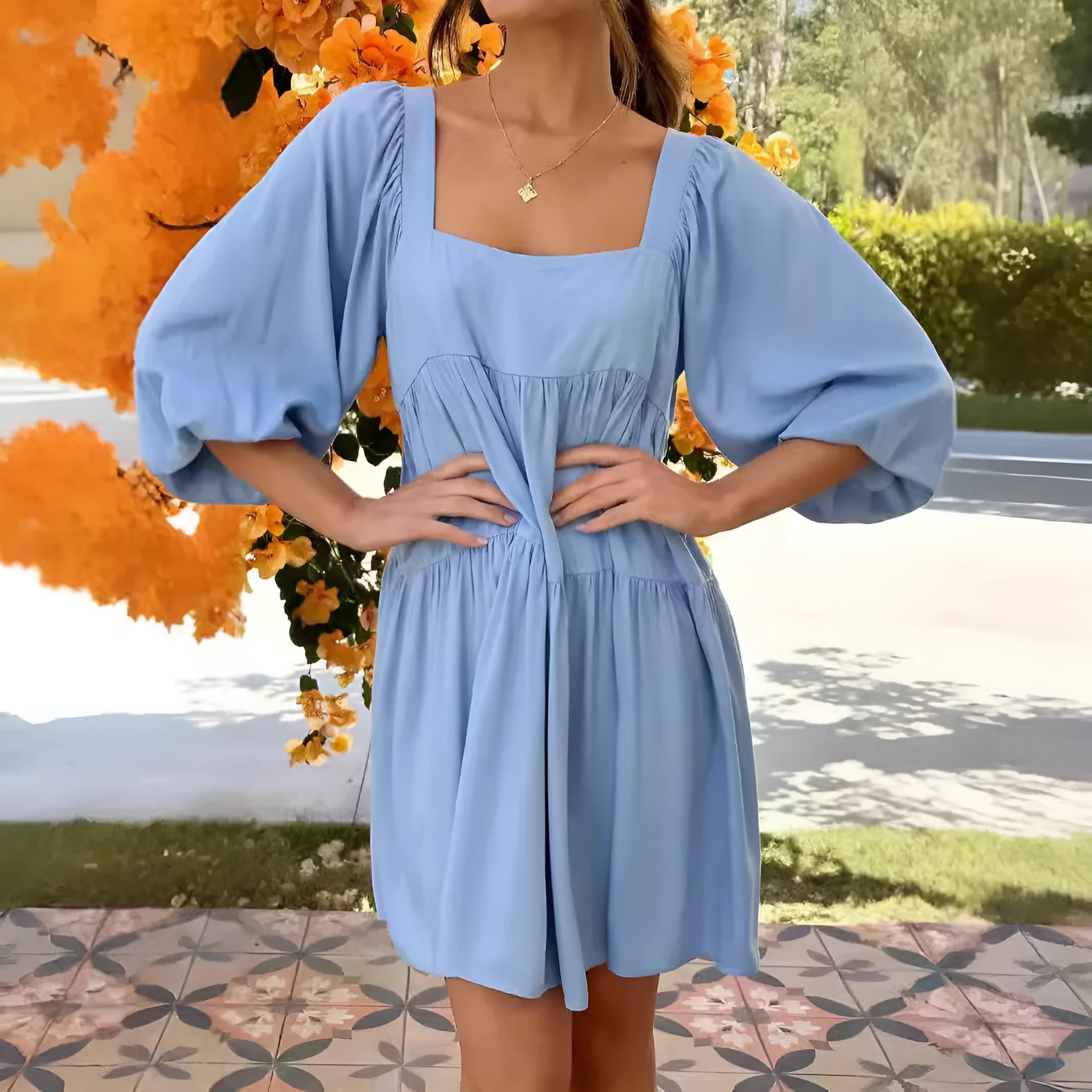 Children's orange backless dress with square collar neckline and puff sleeves in A-line silhouette