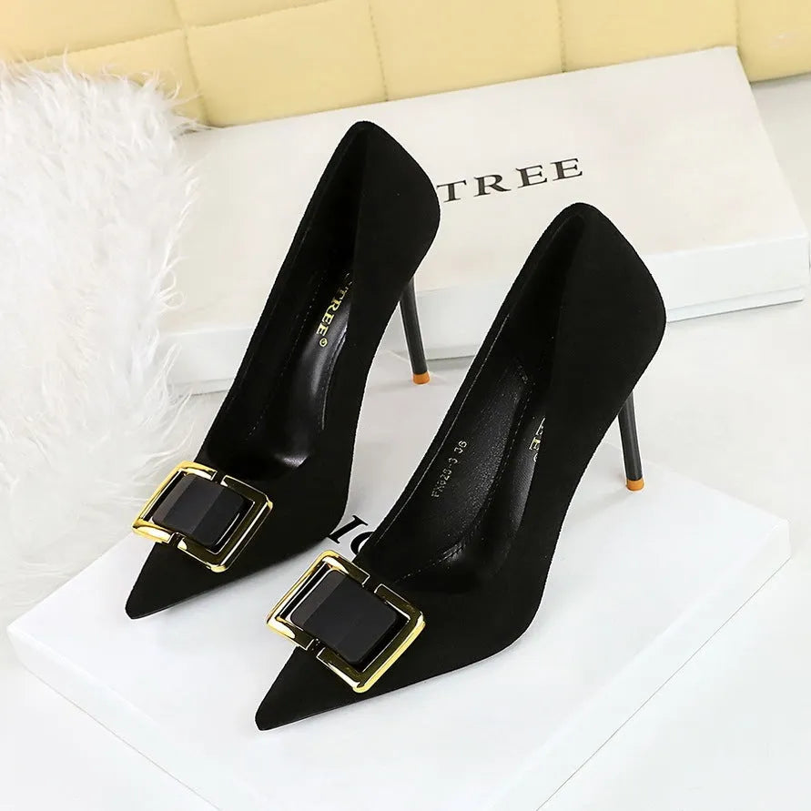Black suede women's stiletto high heels with a pointed toe and 9cm heel.