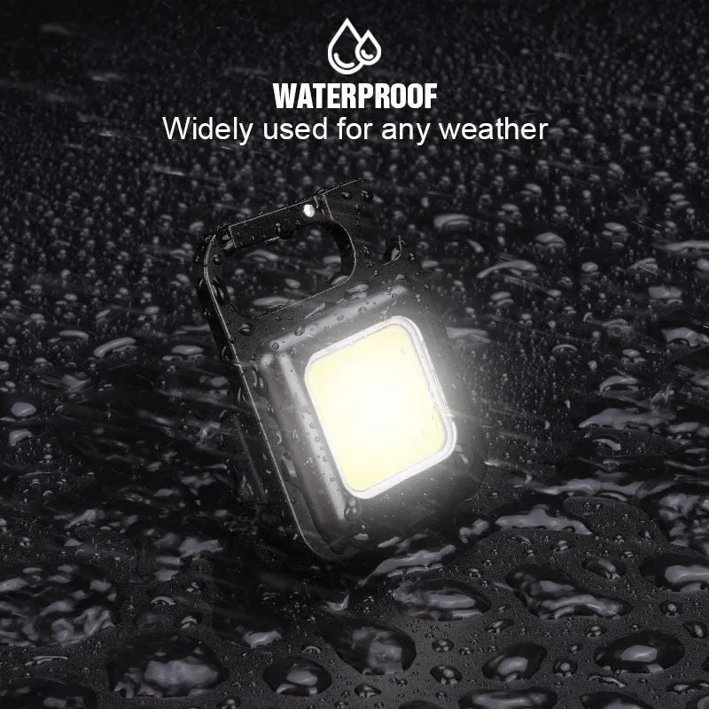 Black aluminium alloy USB rechargeable keychain flashlight with magnetic base and foldable handle