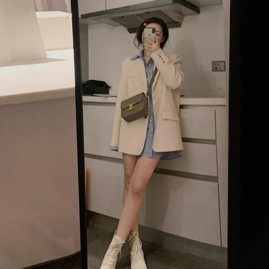 Korean street style polyester suit jacket in milky white colour with pocket detailing and regular sleeves