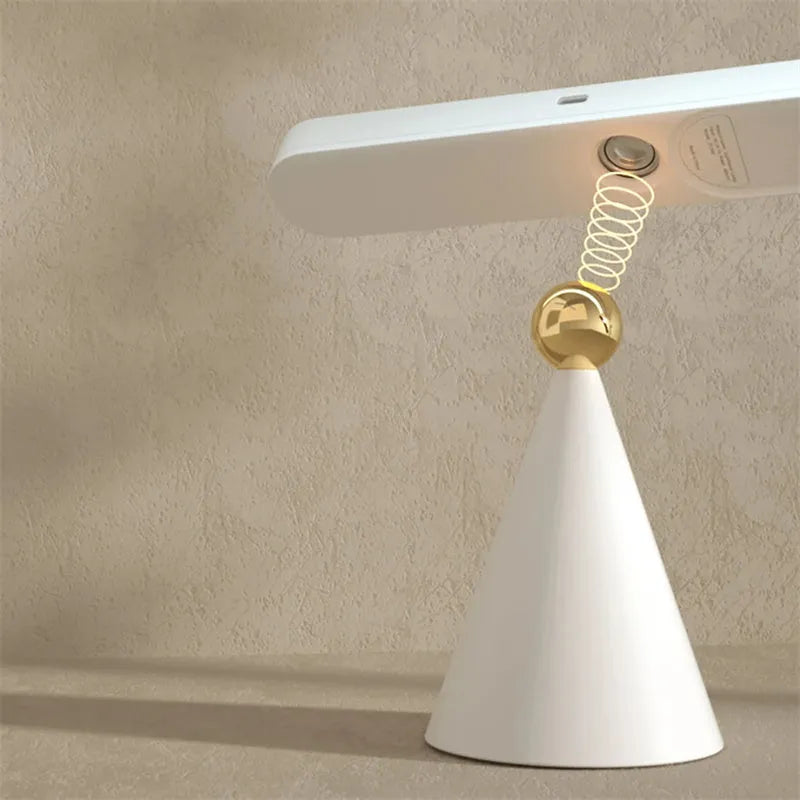 Geometric khaki desk lamp with magnetic wall suction mount and USB cable