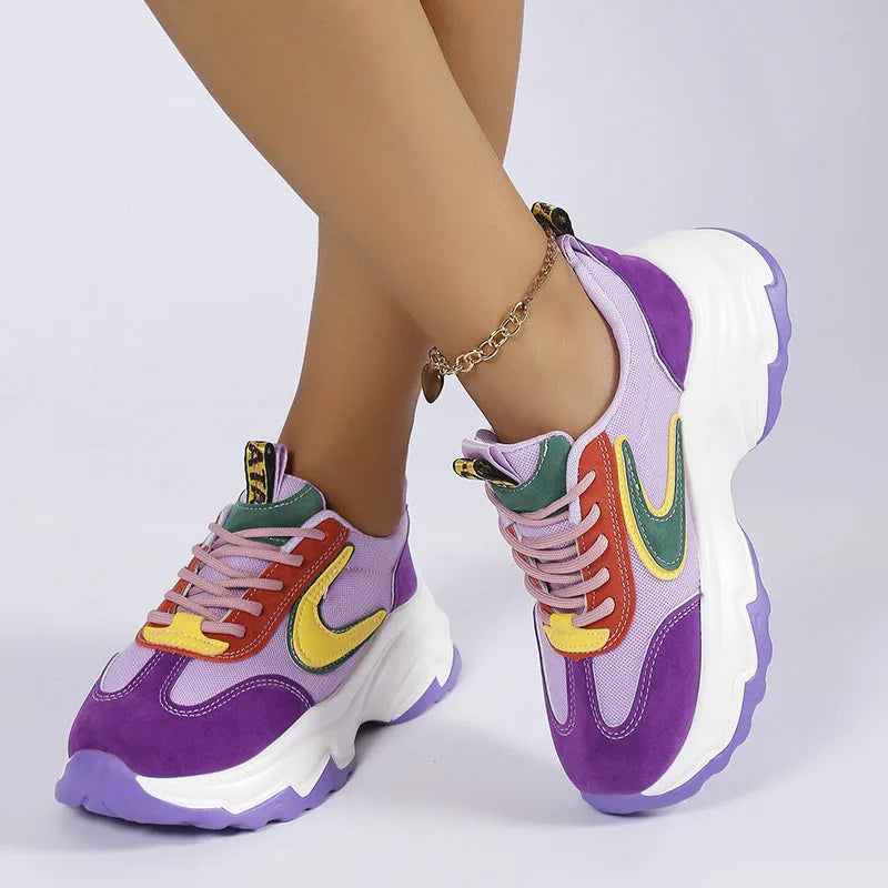 Mixed-colour women's lace-up sneakers with breathable mesh upper, thick rubber sole, and round toe in orange and purple