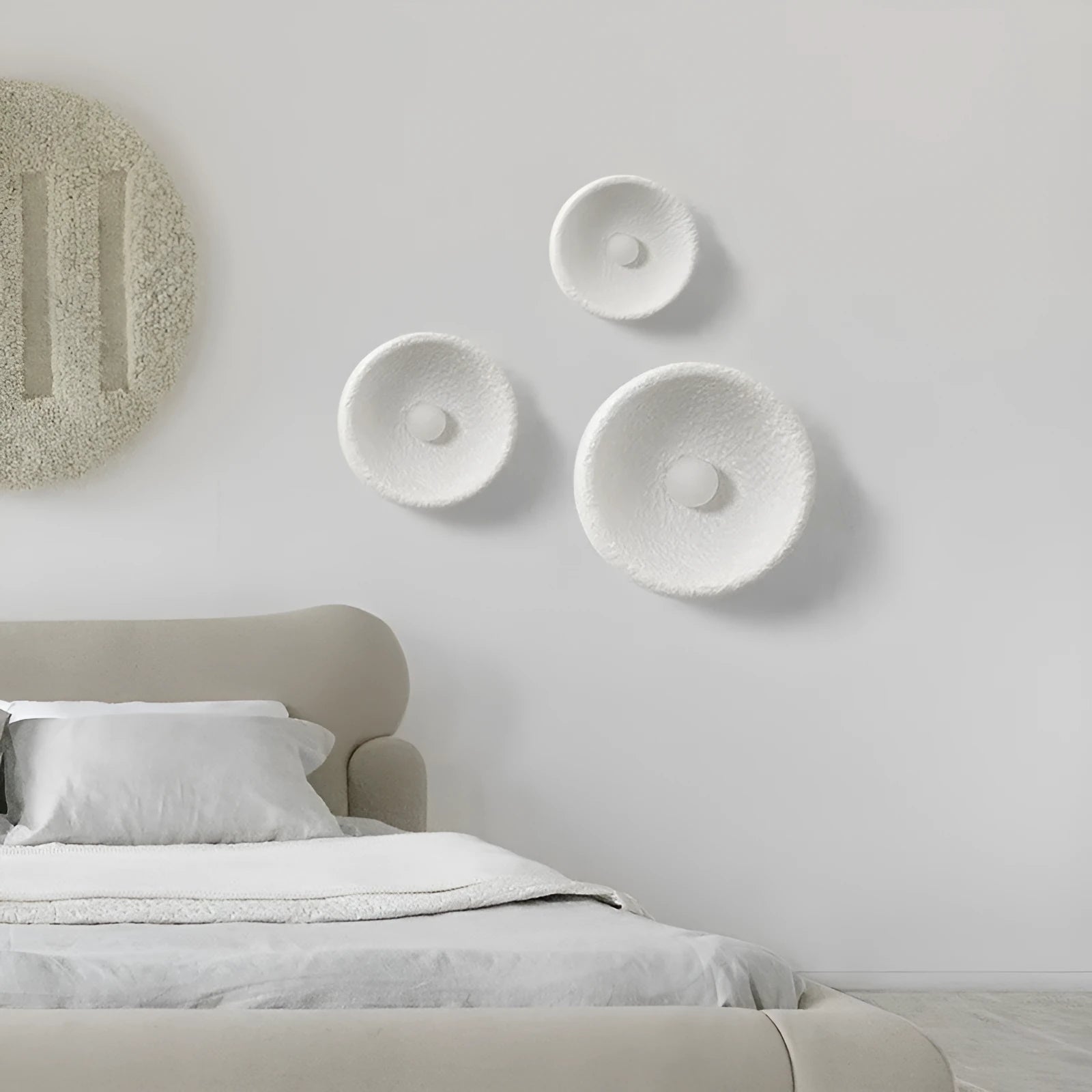 Japanese-style minimalist wall lamp with resin shade in three diameter sizes for modern interiors