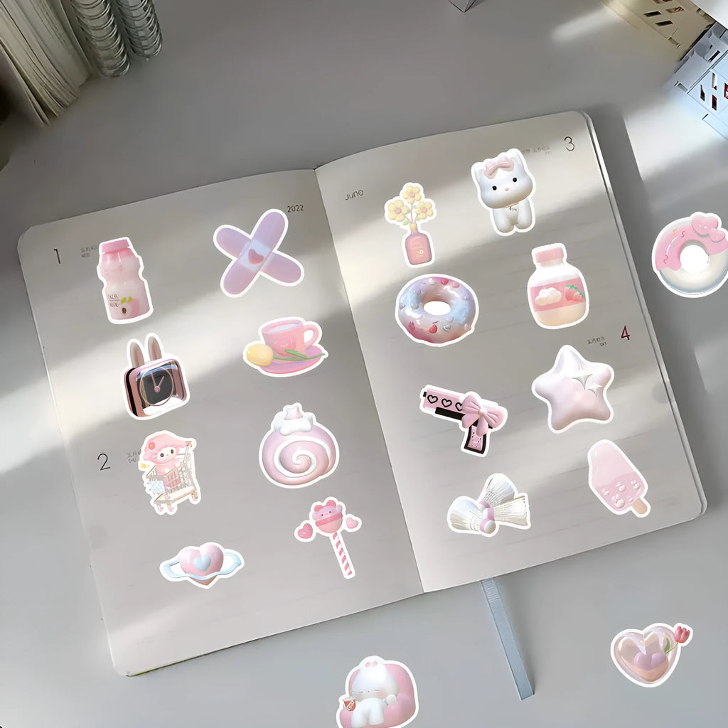 Close-up of realistic 3D decorative stickers showing pink girl and heart designs from a 63-piece set.