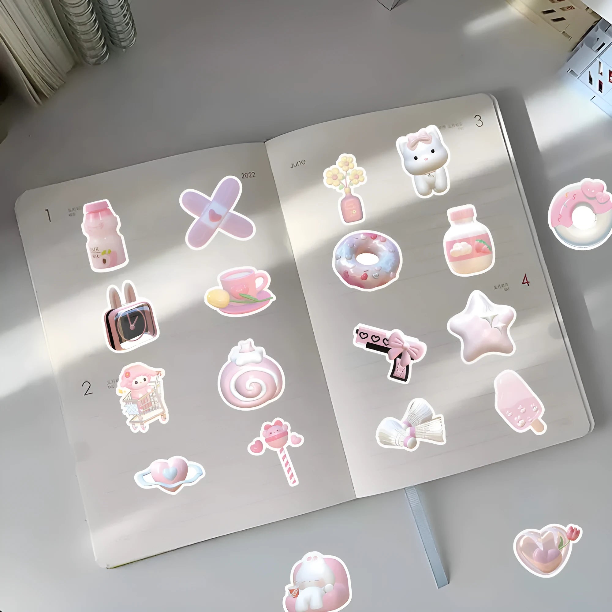 Close-up of realistic 3D decorative stickers showing pink girl and heart designs from a 63-piece set.
