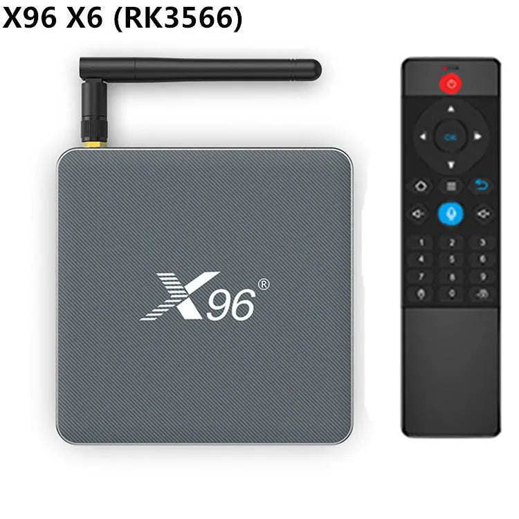 Android Smart Voice Set-top Box with remote control, HDMI cable, and power adapter on a table.