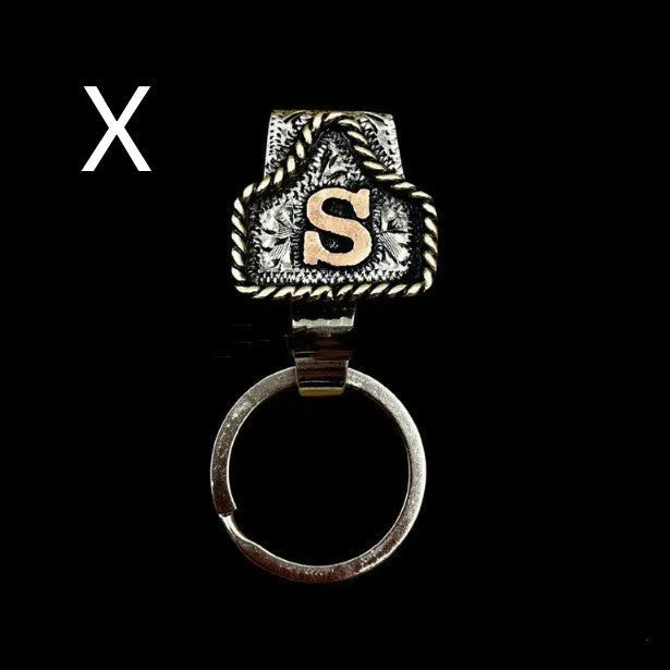 Handmade metal cow tag belt keychain in rustic design with multiple colour options