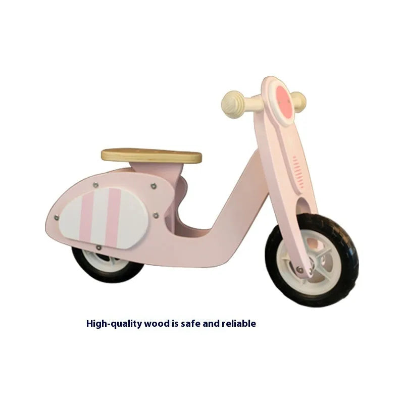 Pink wooden balance scooter for toddlers aged 1 to 6 years.