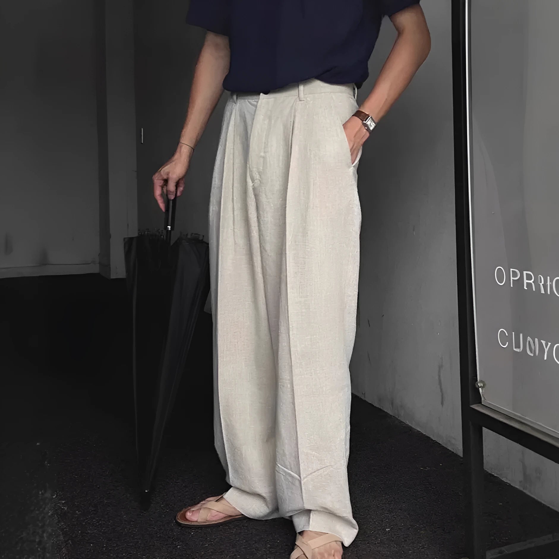 Men's apricot loose-fit cotton linen trousers with a pencil pants leg opening and micro-elastic waistband.