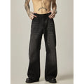 Black loose-fit straight-leg retro jeans with a zipper fly on a mannequin