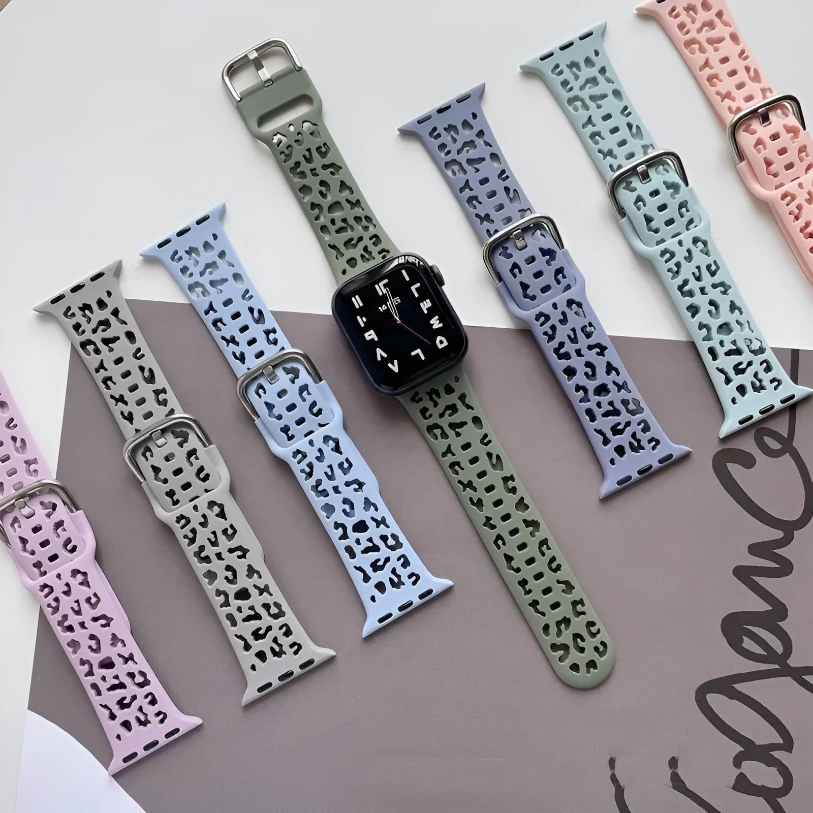 Hollow silicone women's smart watch wristband in pink, fits Apple Watch 38-45mm