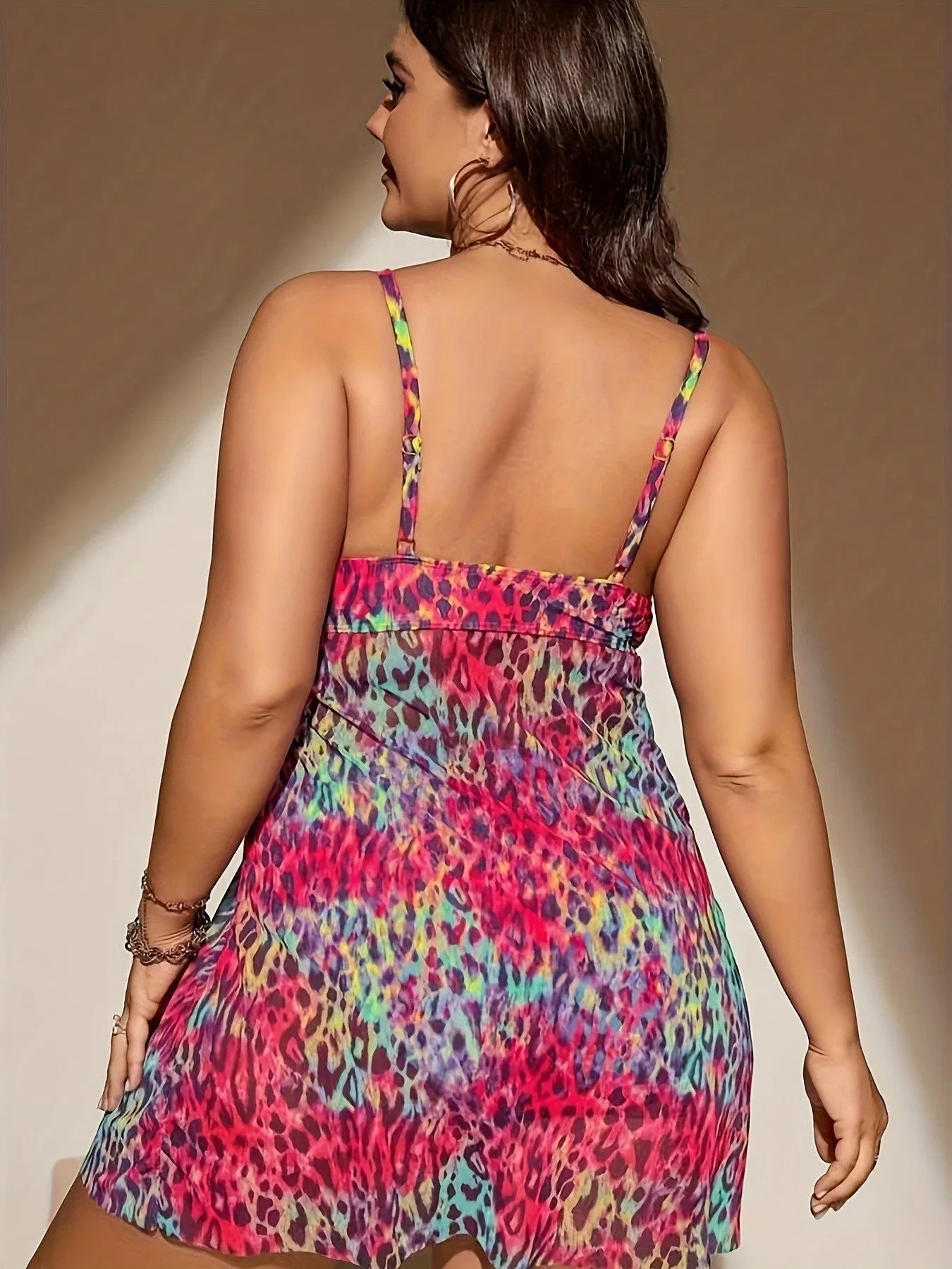 Plus size women's split bikini set in polyester swim fabric with sleeveless top and shorts