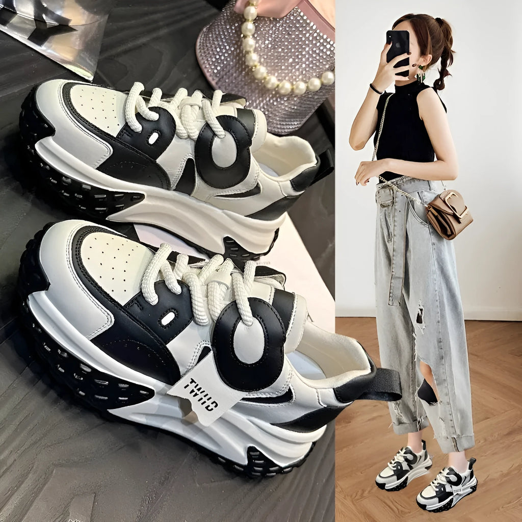 A pair of thick-soled leather sports casual shoes with a wedge heel and lace-up front in a choice of colours.