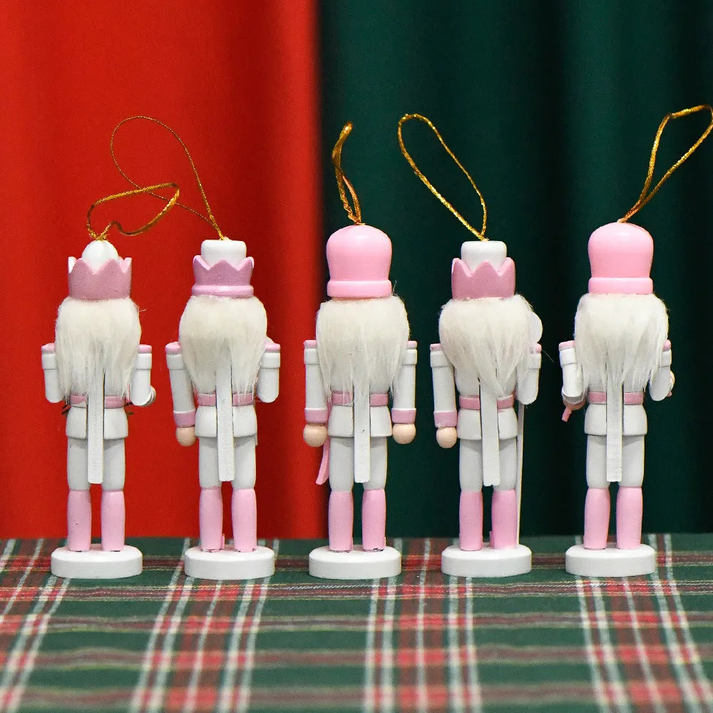 Pink wooden nutcracker soldier figure 13cm tall with classical design