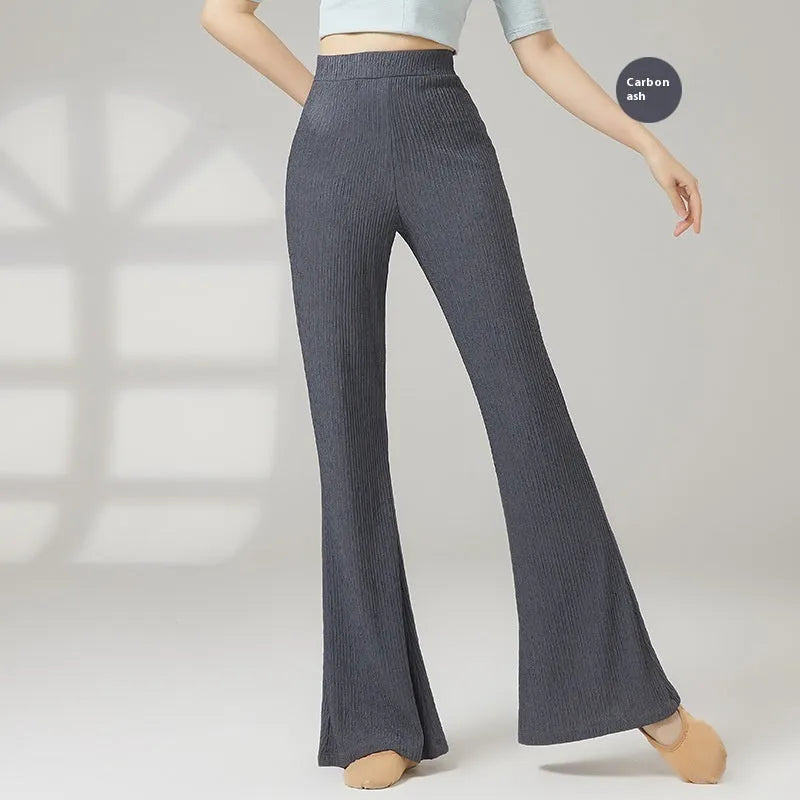 Women's solid colour polyester dance practice pants for classical and sports dance training.