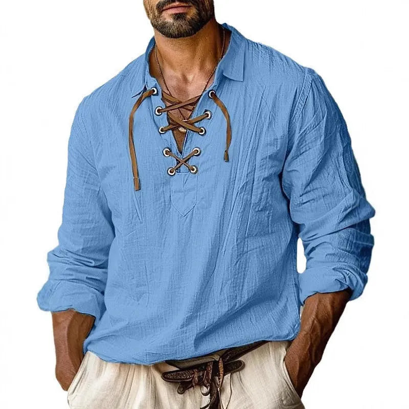 Men's loose-fit linen blend shirt in blue with lapels and lace detailing on the front.