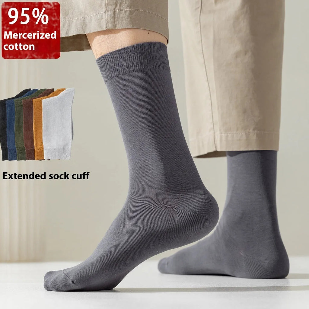 Mid-calf length men's business socks in solid colours, made from pure combed cotton.
