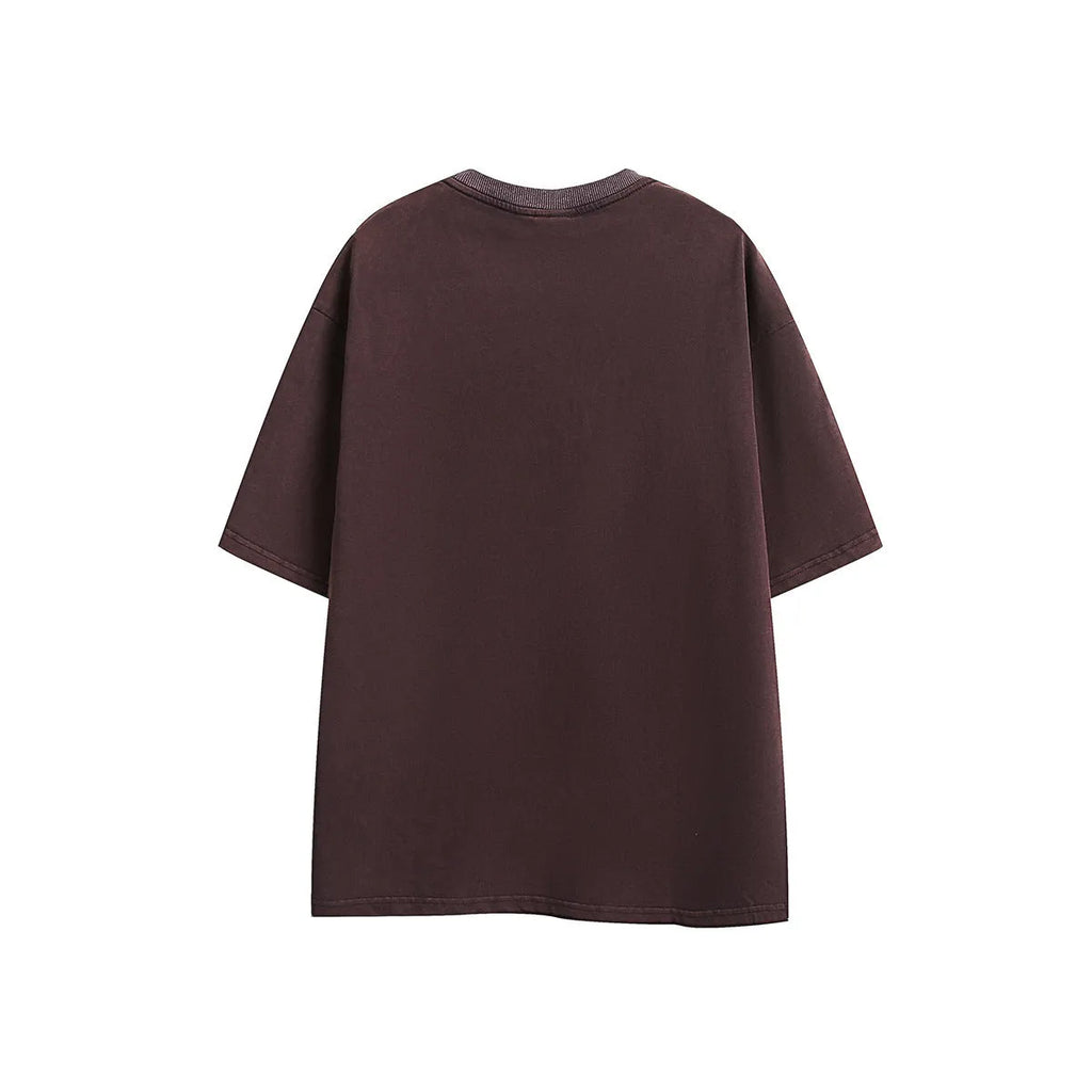 Purple and black loose-fit embroidered retro short-sleeved cotton t-shirt laid flat.