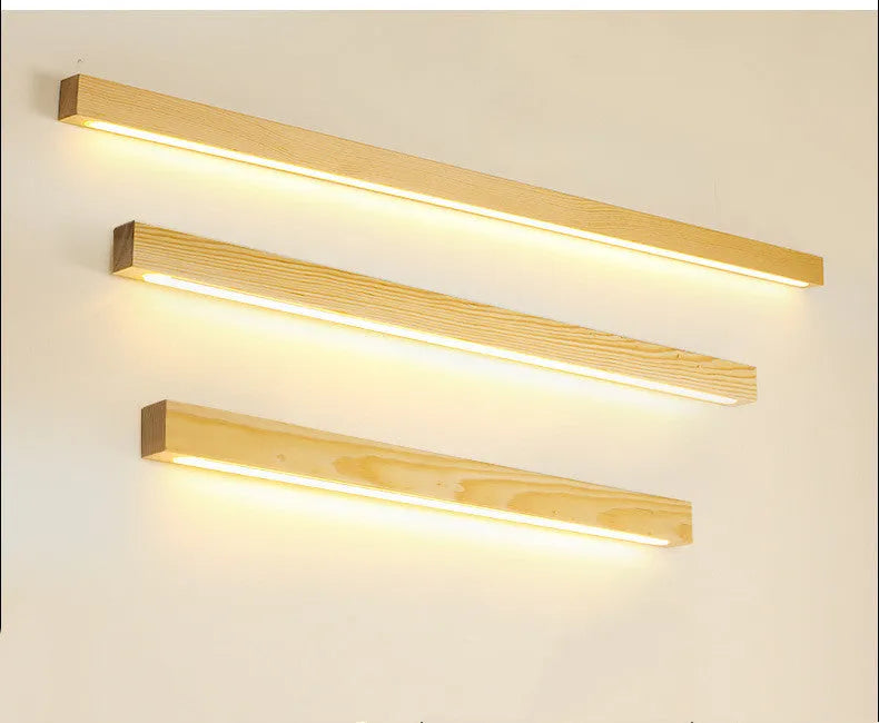 Wooden log strip wall lamp with LED lighting in walnut finish