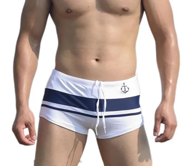 Men's anchor string swim shorts in solid colour with polyester and spandex fabric, adjustable drawstring waist, available in multiple sizes