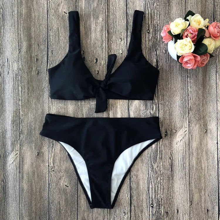 Women's solid colour bikini set with sleeveless top and matching briefs in polyester fabric