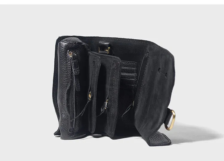 Handmade vintage cowhide leather wallet in black showing tape extraction closure
