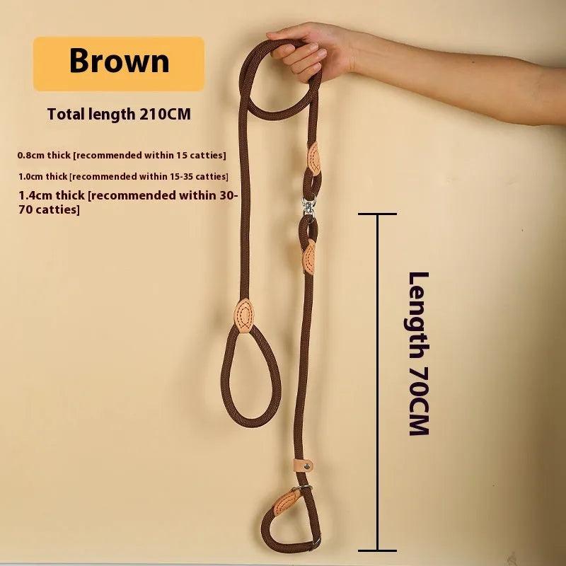 Brown nylon dog leash with P-chain hand holding rope showing 2.1 metre length