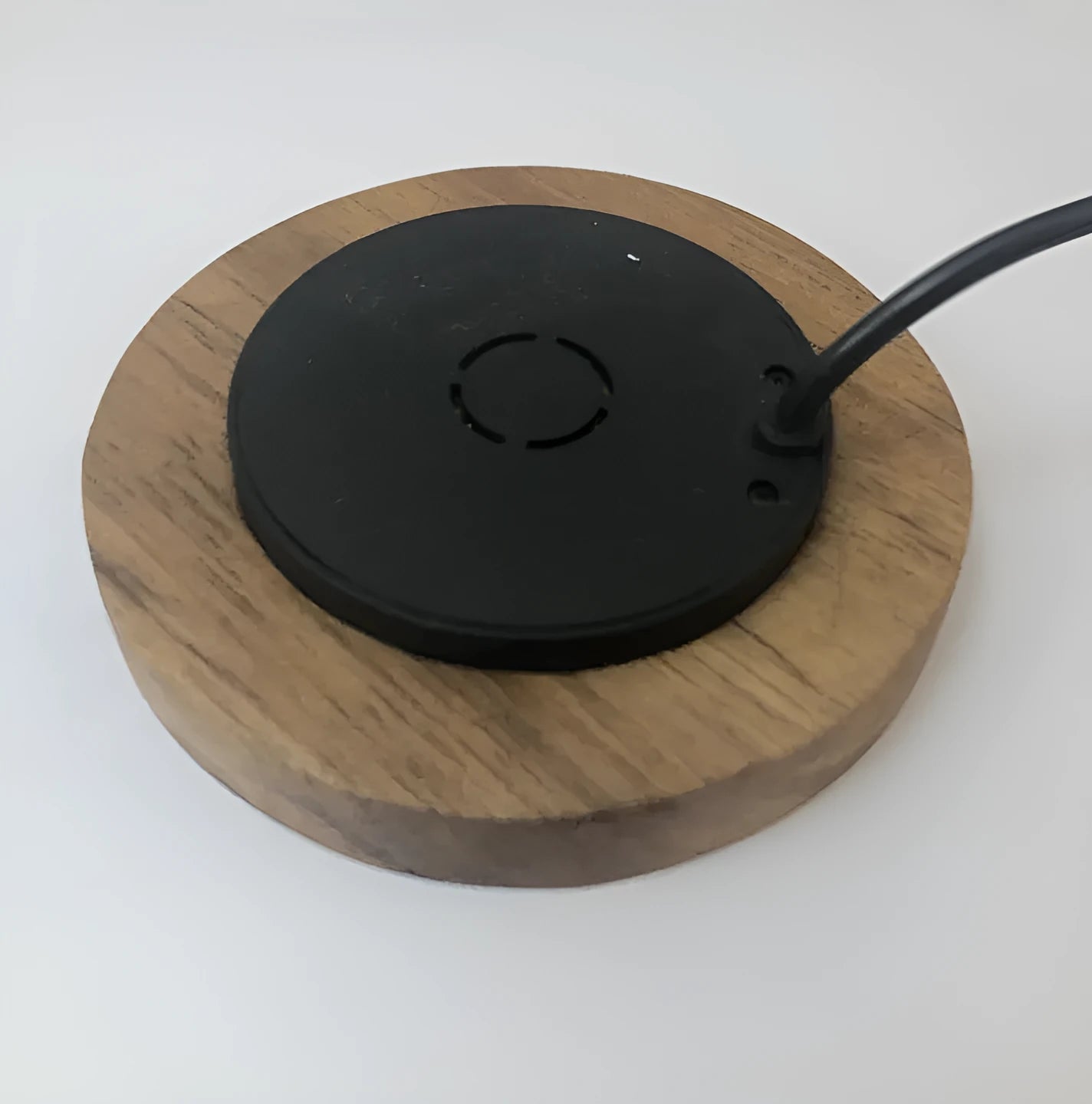 Black embedded wireless phone charger for furniture installation with 60mm diameter