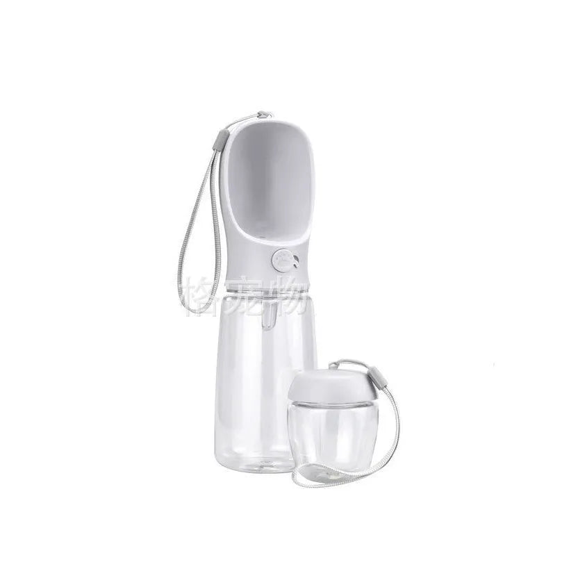 Portable dual-use dog water bottle with split grain cup design in blue, pink, or white colours