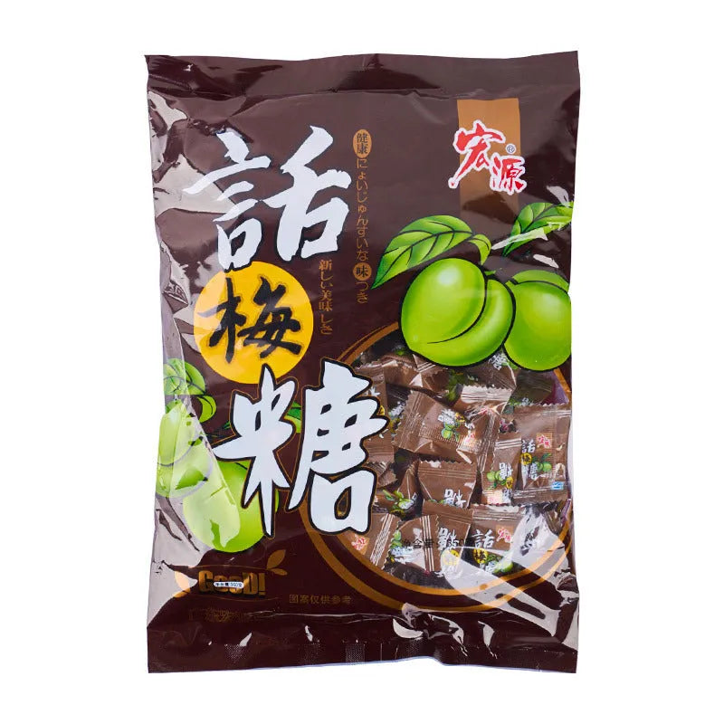 Assorted hard candies in plum, guava, and tangerine peel flavours in a bag.