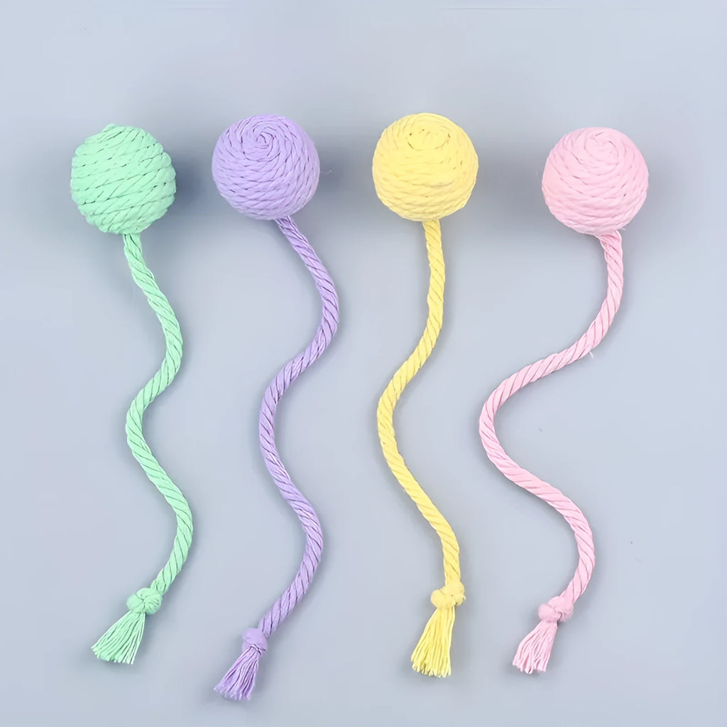 Colourful cat toy ball with attached rope and internal bell in green, pink, purple, and yellow options