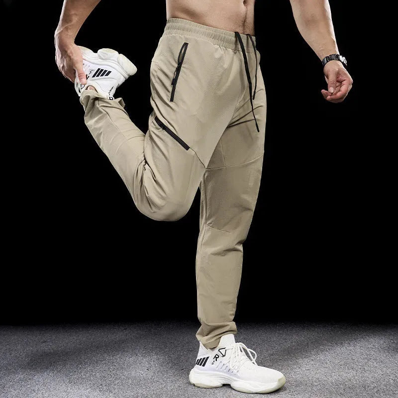 Men's waterproof quick-drying nylon exercise trousers in Army Green colour