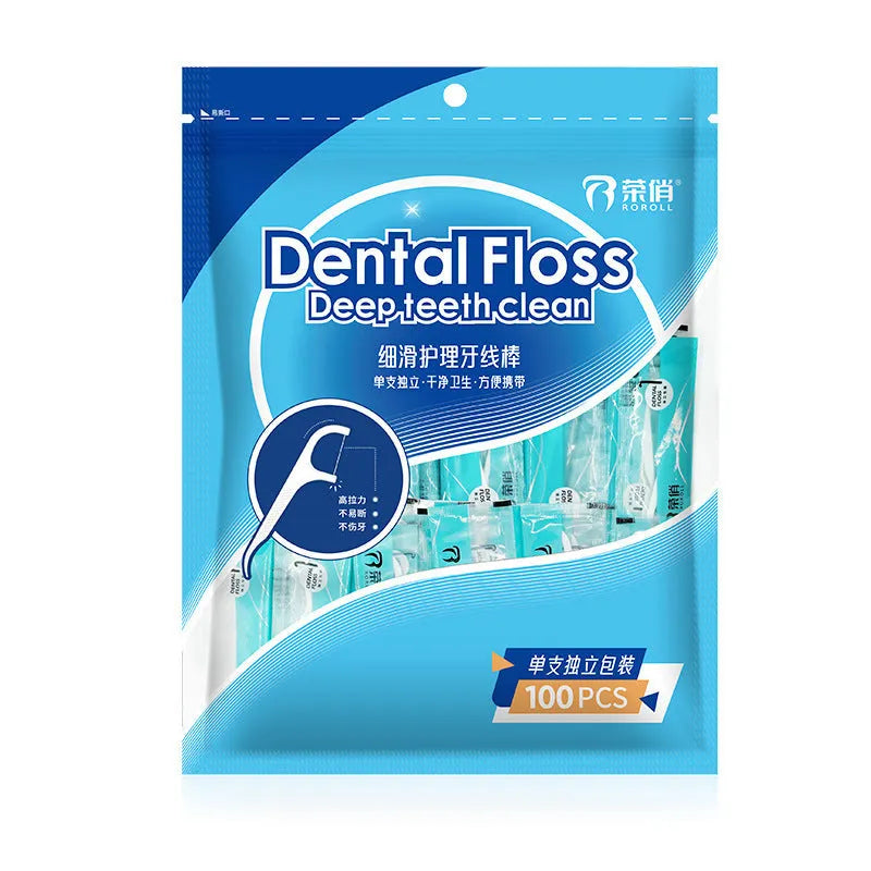Plastic dental floss packets in a bag, showing independent packaging and 100/108 piece count options
