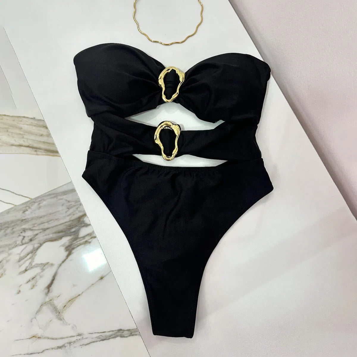 Nylon one-piece solid colour swimsuit for women in black, brown, or red sizes S M L for swimming and wading