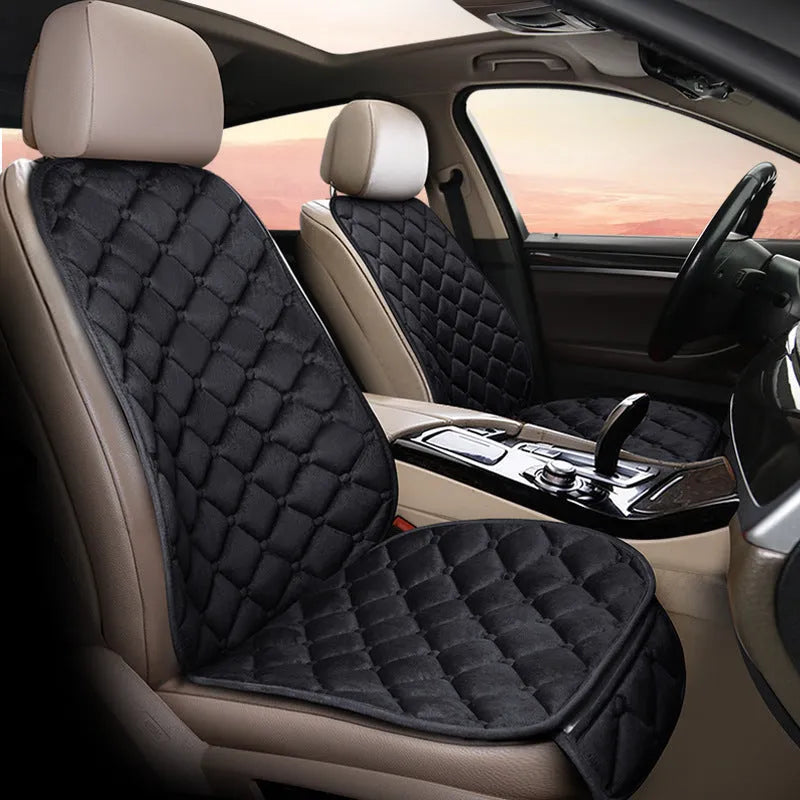 Ringer plush cotton winter car seat cushion shown in a burgundy colour on a car seat.