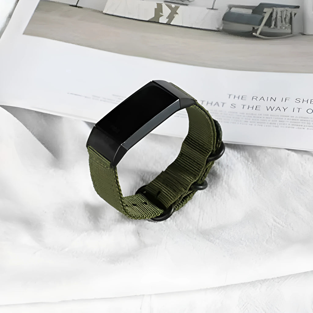 Army Green nylon replacement strap with a three-ring metal buckle for a Fitbit Charge 3 or Charge 4 fitness tracker.